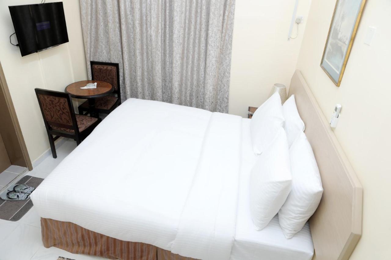 Blue Sky Way Hotel دبي المظهر الخارجي الصورة
